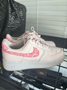 Nike Women’s Light Pink Low-Top Sneakers with Pink Paisley Swoosh